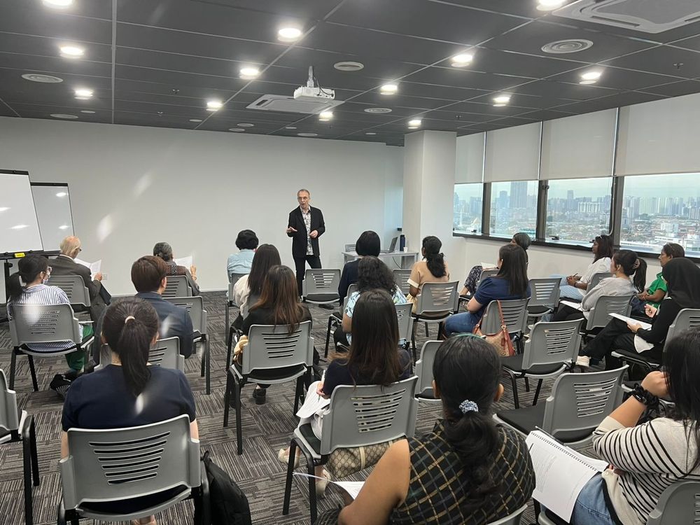 Corporate training session with city skyline view