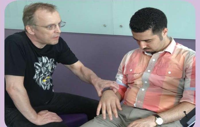 Andreas Dorn working with a participant
