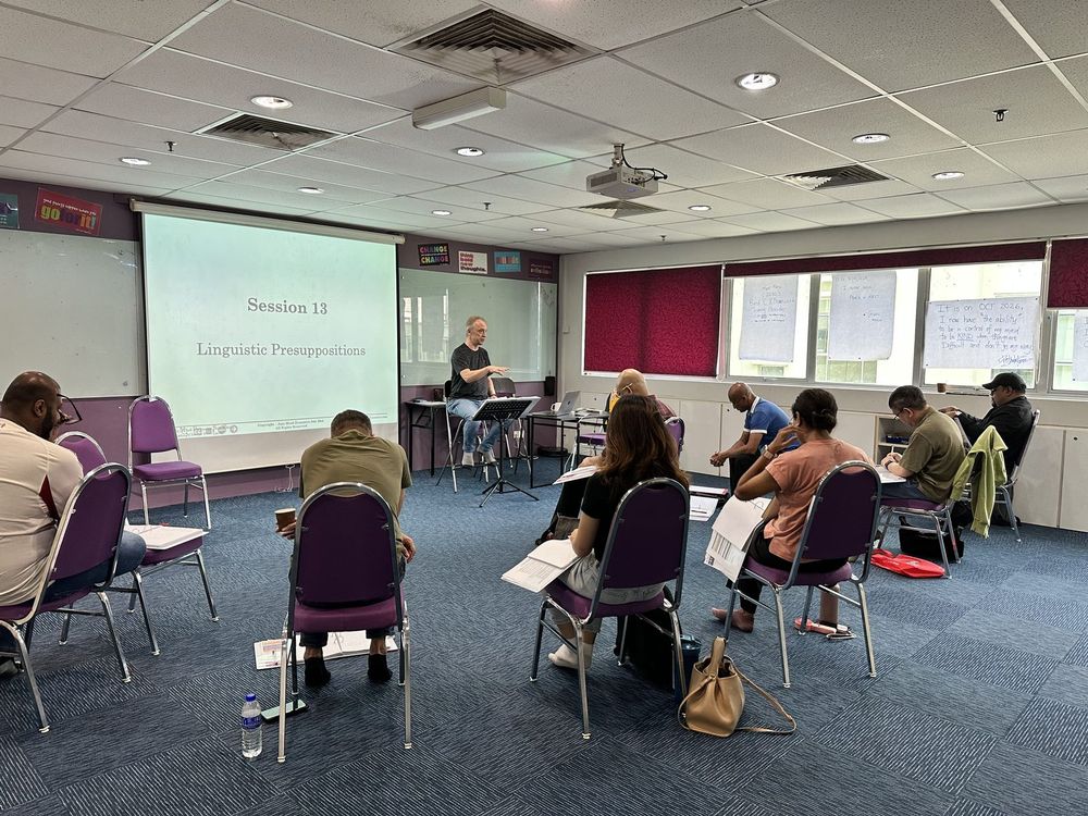 Full classroom during a live NLP session